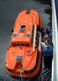 Clambouring aboard from the tender