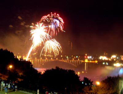 Fireworks and Light Show over the Falls - Rainbow Bridge with the American Falls